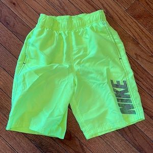 Small, Nike swimming trunks.